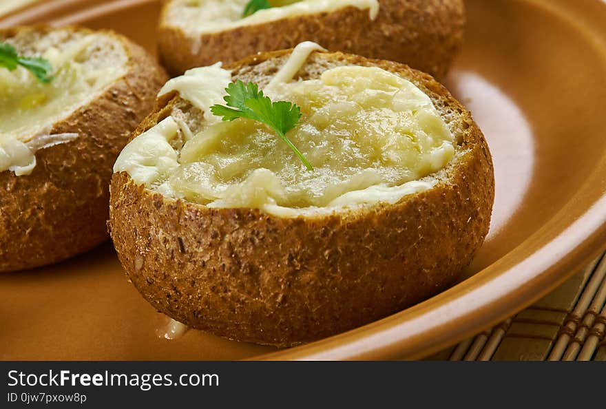 Onion Soup Bread Bowls , French Onion Soup into the bread bowls.