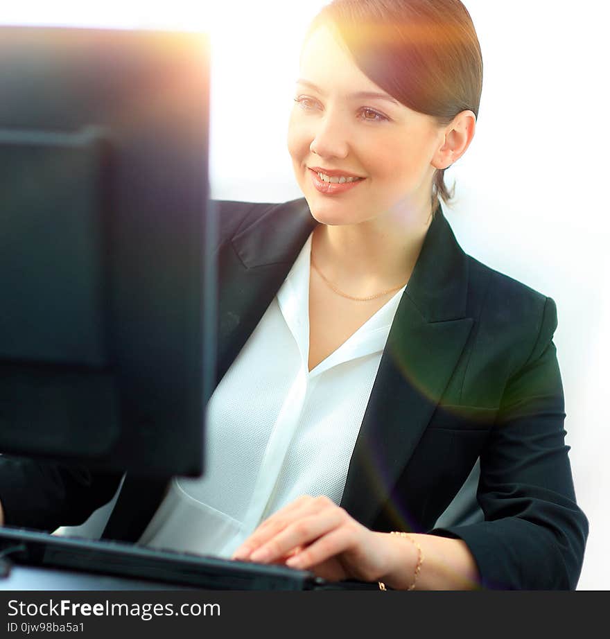 Closeup Of A Confident Young Business Woman Working On Computer