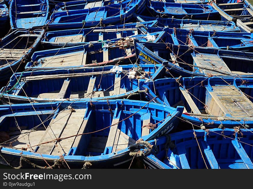 Blue boats in port