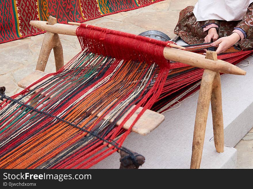 Carpet weaving.