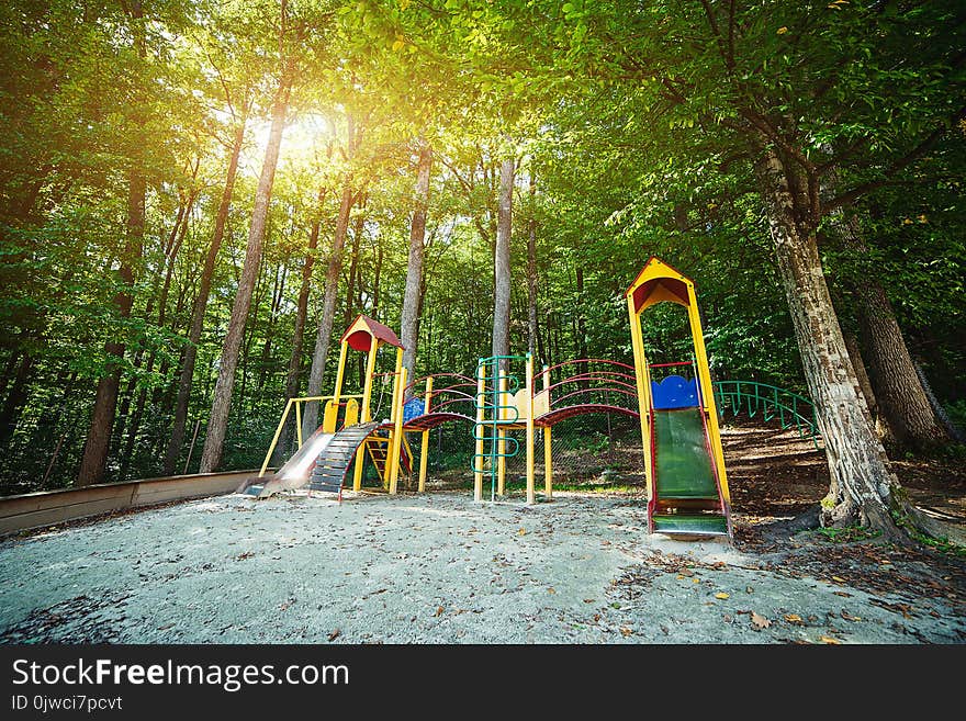 Children playground in the park in a sunny day