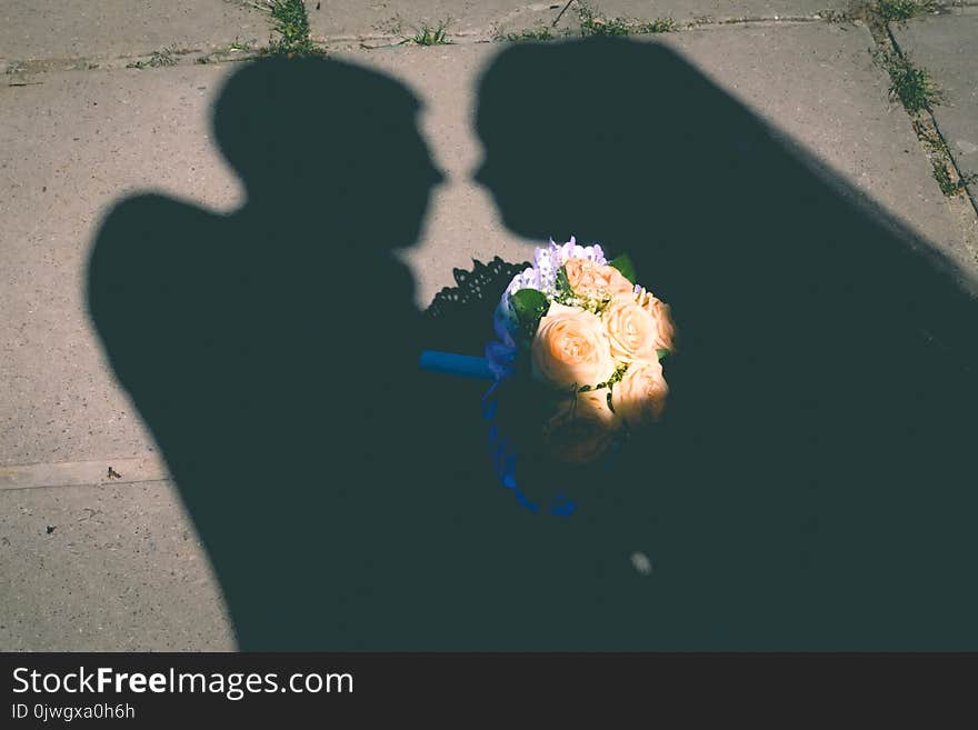 Young wedding couple enjoying romantic moments outside on a summer meadow, bouquet, woman, day