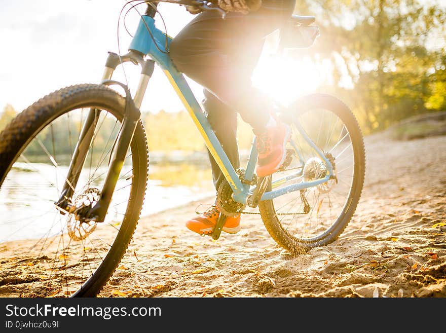 Photo of woman riding bicycle on summer day