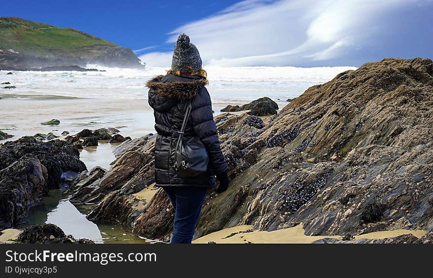 Person in Black Bubble Jacket