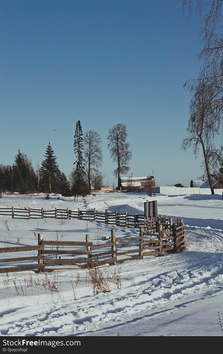 Brown Wooden Fence during Winter