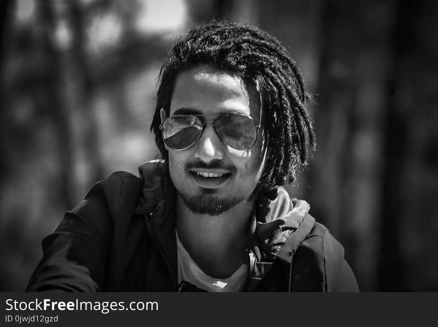 Grayscale Photography of Man Wearing Sunglasses