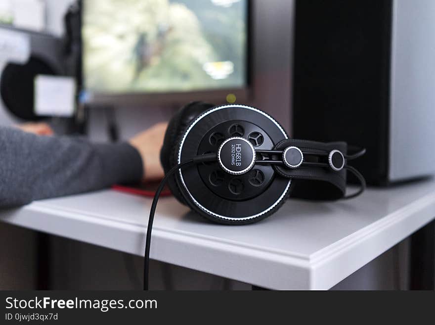 Black Corded Headset on White Table