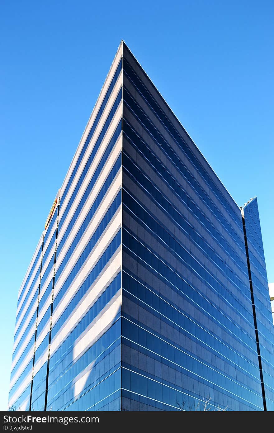 Gray Concrete Building Under Blue Sky