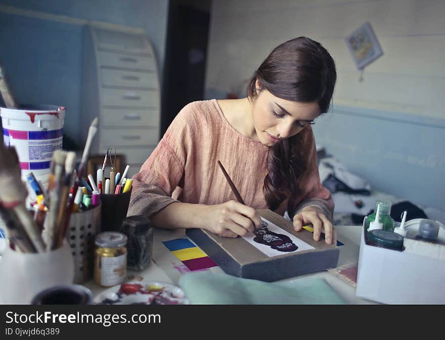 Woman in Brown Scoop-neck Long-sleeved Blouse Painting