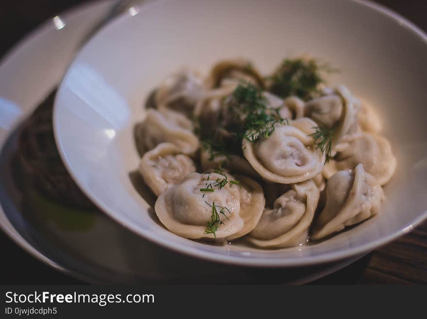 Cooked Dumplings in White Ceramic Bowl