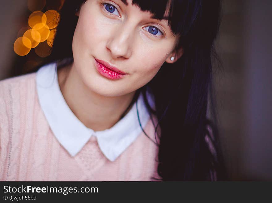 Woman Wearing White and Pink Shirt