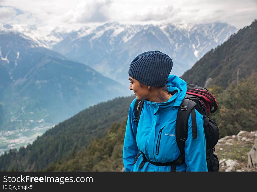 Person on Top of Mountain