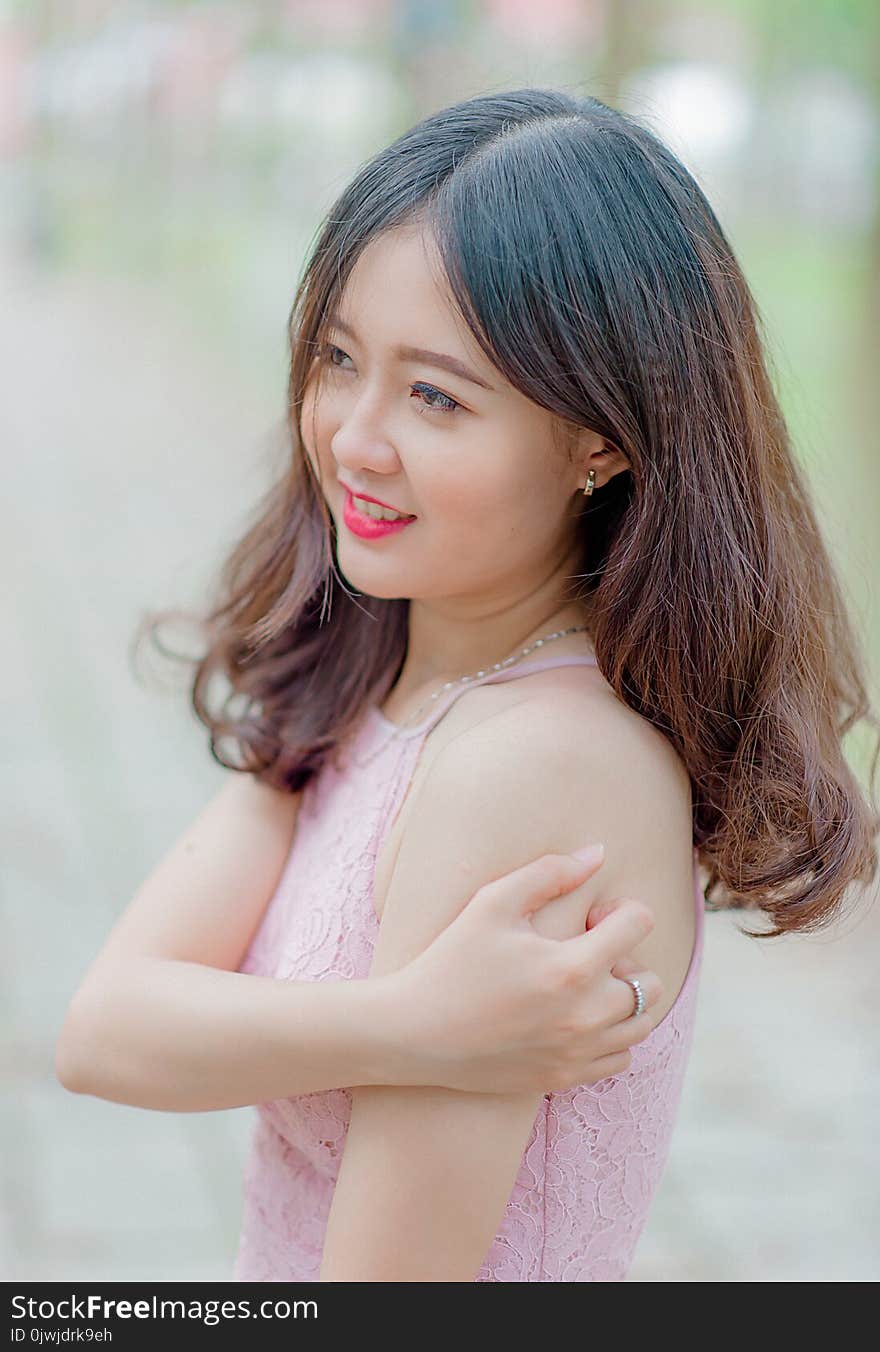 Woman Wearing Pink Tank Top