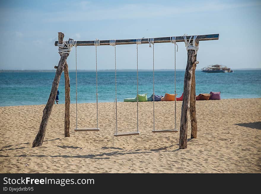 Photo of Three Swing Chairs