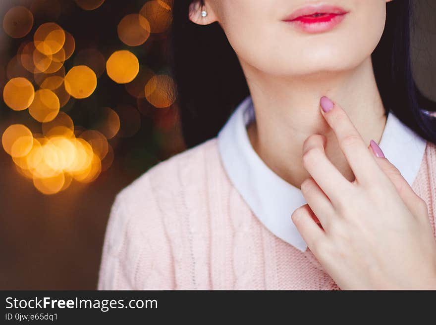 Woman Touching Neck