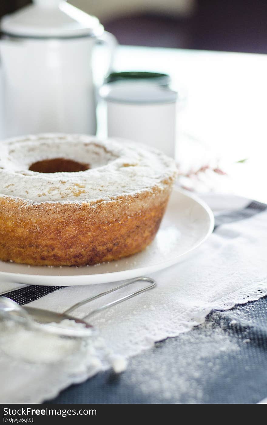 Donut on White Ceramic Plate