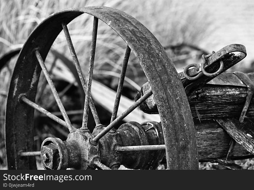 Rusted Wheel Grayscale Photo