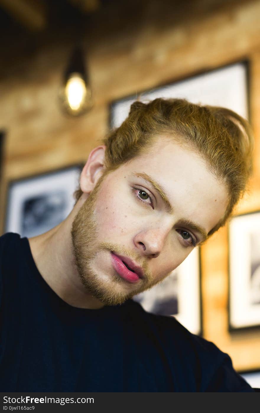 Man in Black Crew-neck Top With Pink Lips