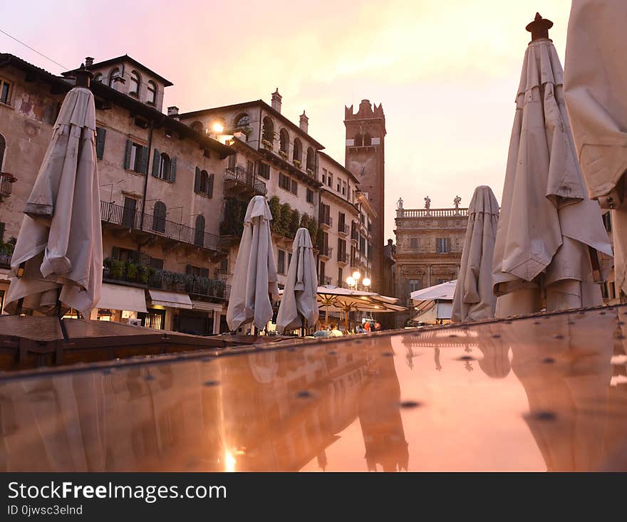 Piazza delle Erbe and Gardello tower at the background in center of Verona city, Italy