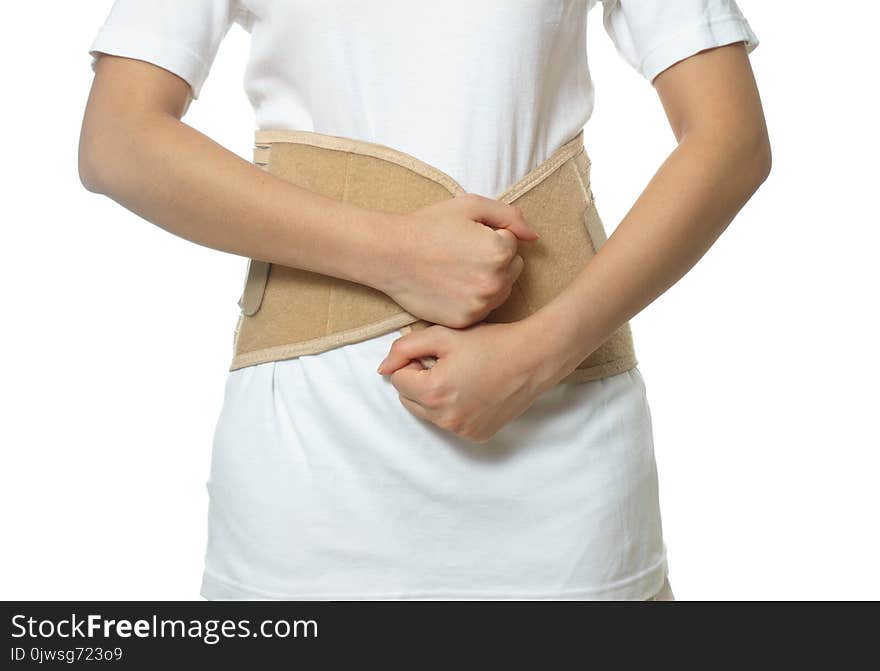 Woman wearing back support belt isolated on white background