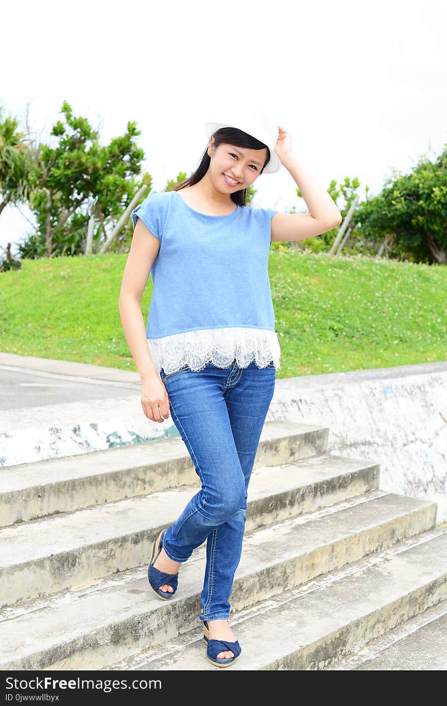 Young woman relaxing at the park. Young woman relaxing at the park