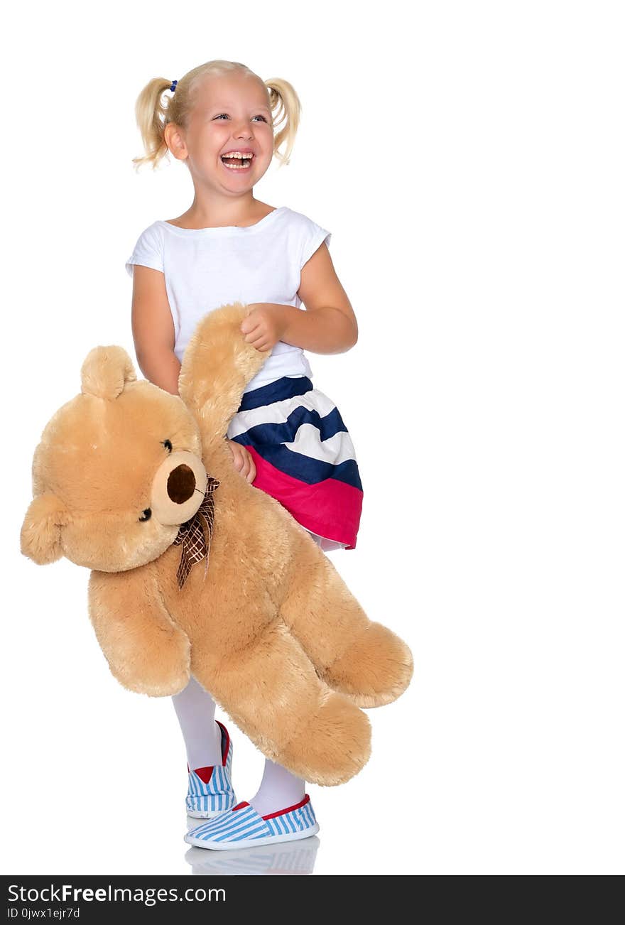 Little girl with teddy bear