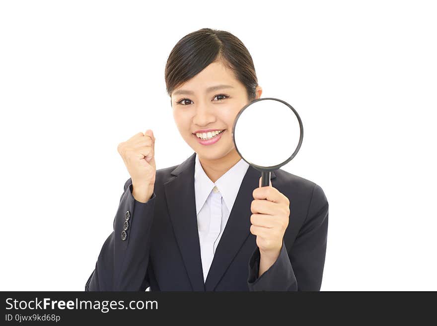 Woman with a magnifying glass