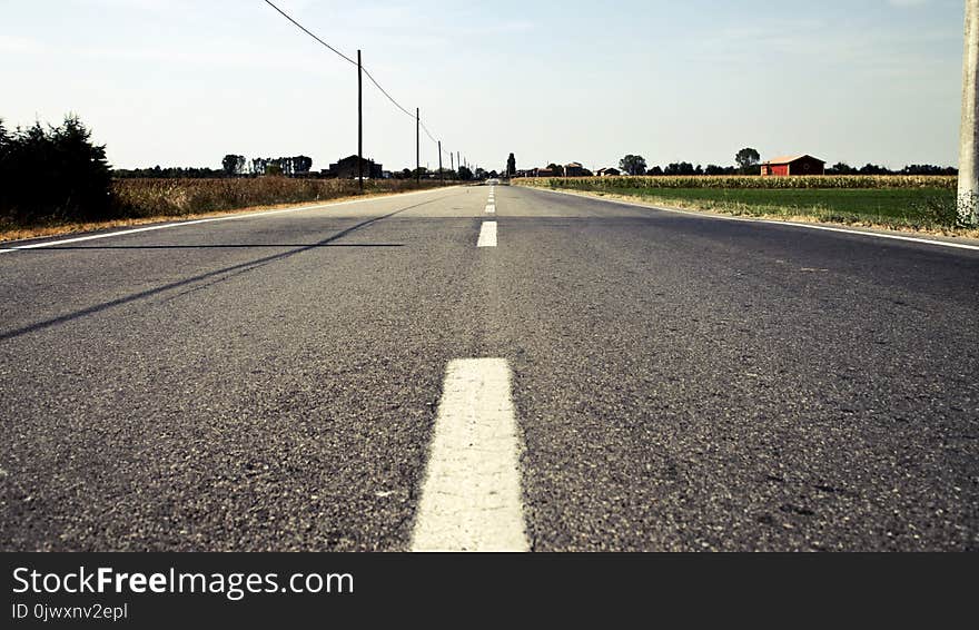 Closeup Photo of Gray Pavement Road