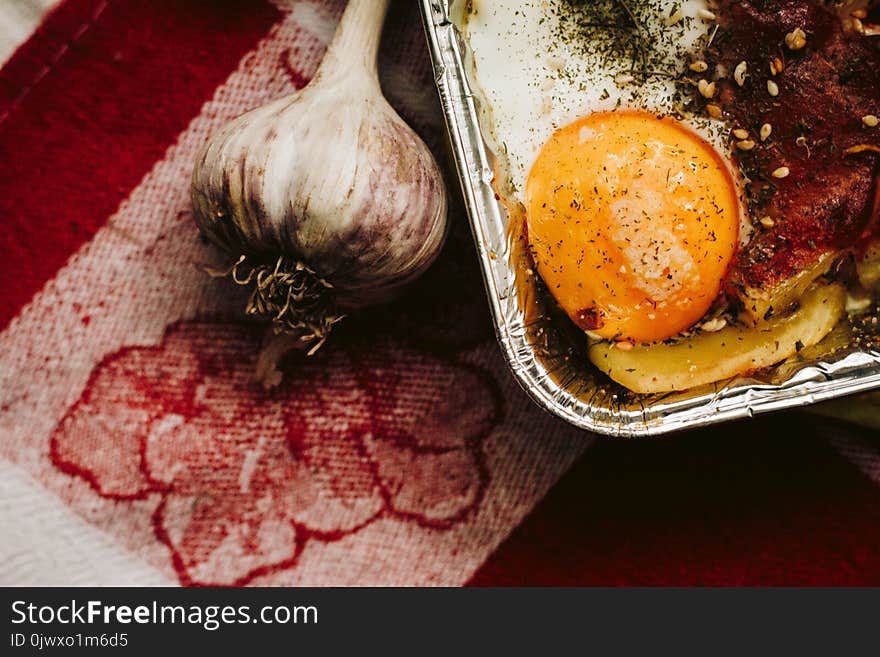 Close-up Photography of Garlic and Egg Yolk