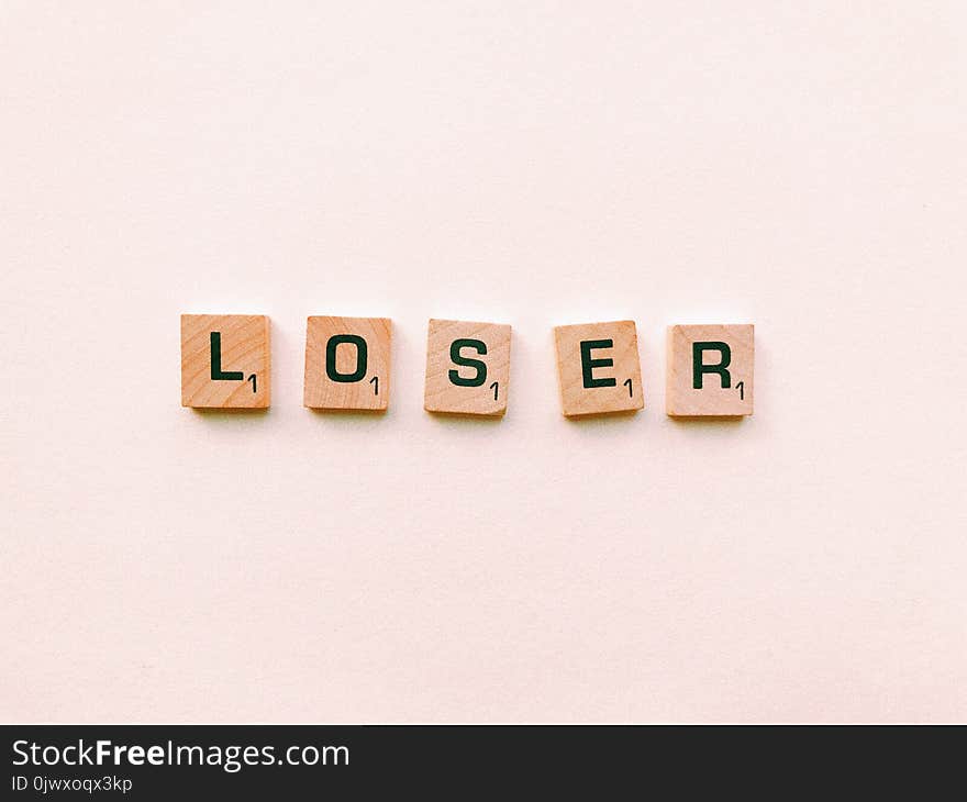 Closeup Photography of Loser Scrabble Letter