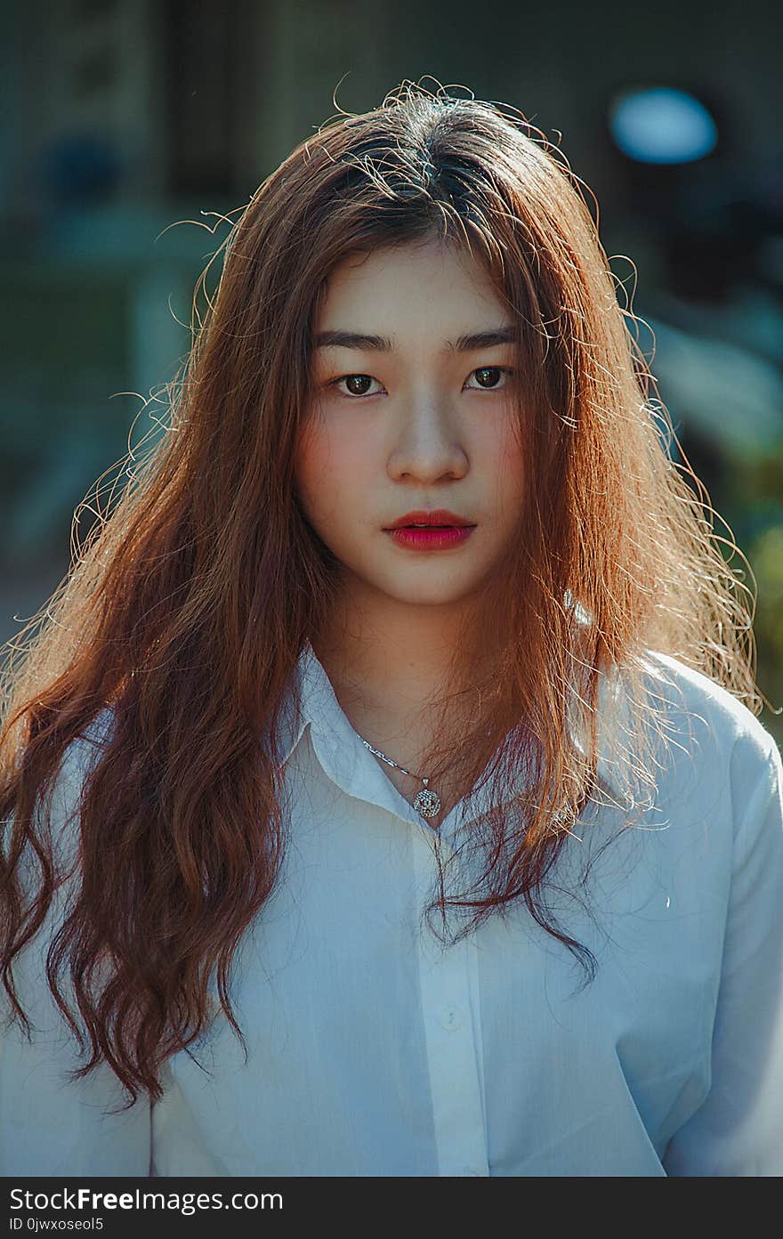 Woman in White Dress Shirt