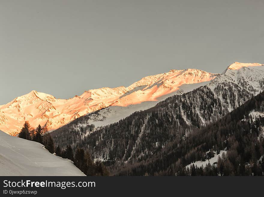 Snow Capped Mountain Shined by the Sun