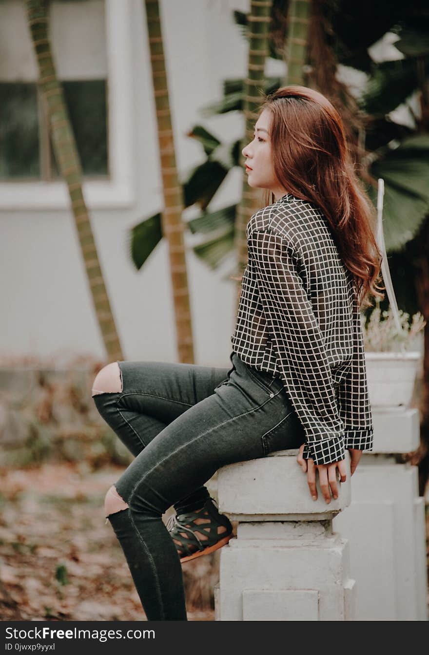 Woman Wearing Black and White Grid Chiffon Dress Shirt