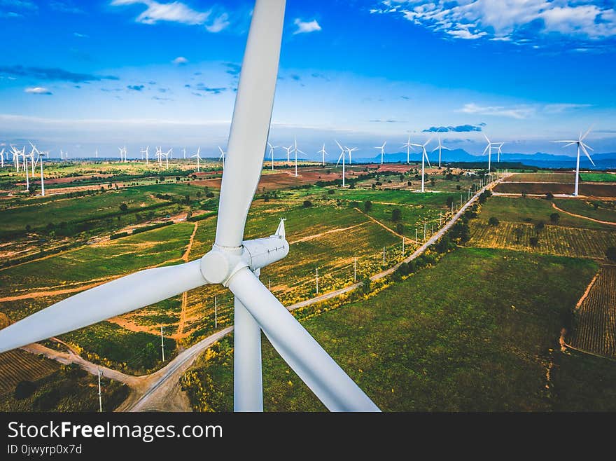 Wind turbine from aerial view. Sustainable development, environment friendly of wind turbine by giving renewable, sustainable, alternative energy. Wind turbine from aerial view. Sustainable development, environment friendly of wind turbine by giving renewable, sustainable, alternative energy.