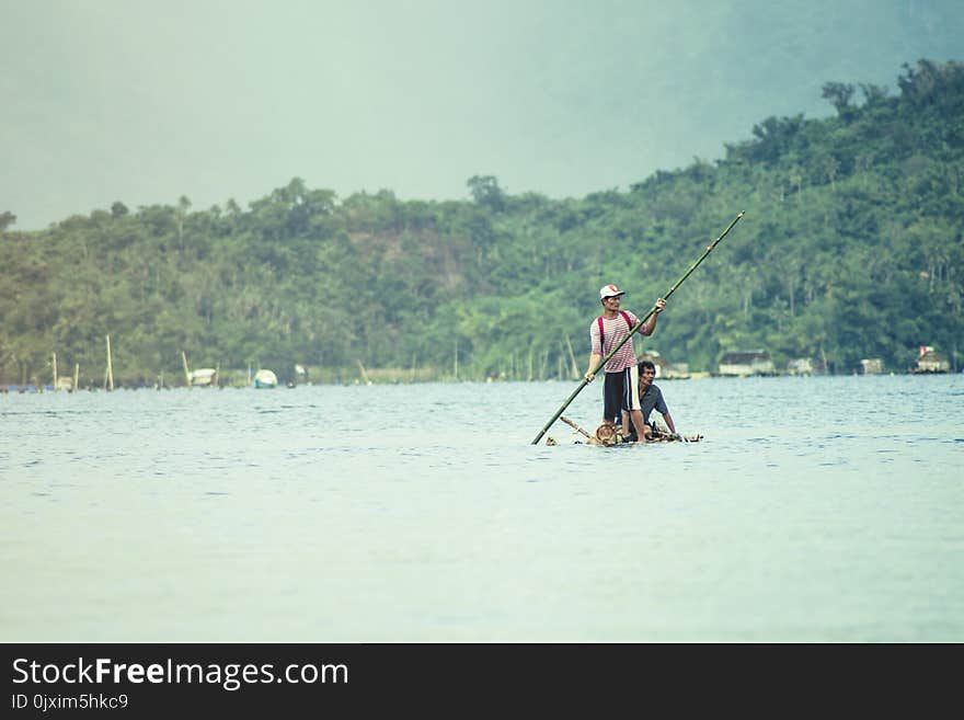 Photo of Men Fishing