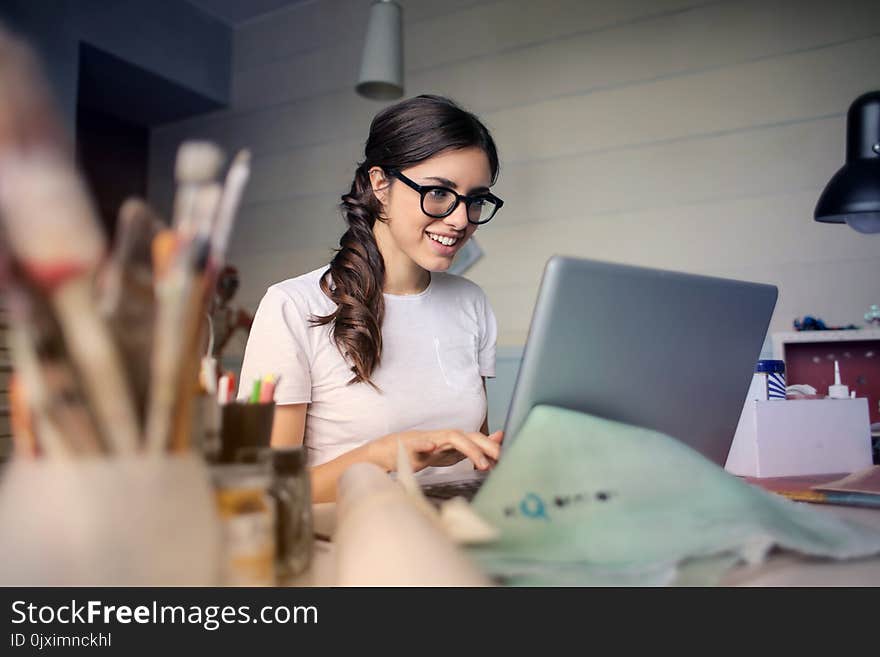 Photo of Woman Using Her Laptop