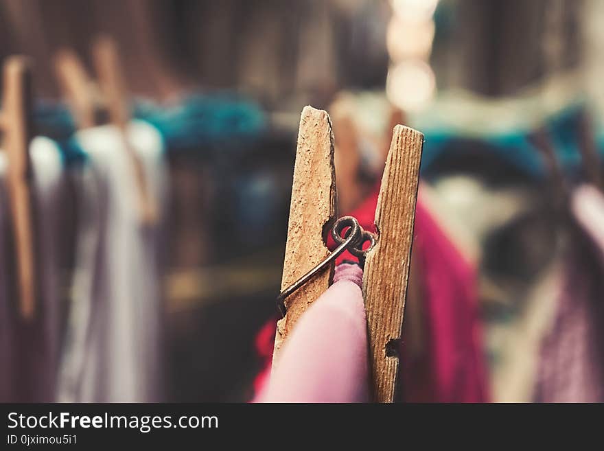 Close-up Photography of Wooden Clothespin