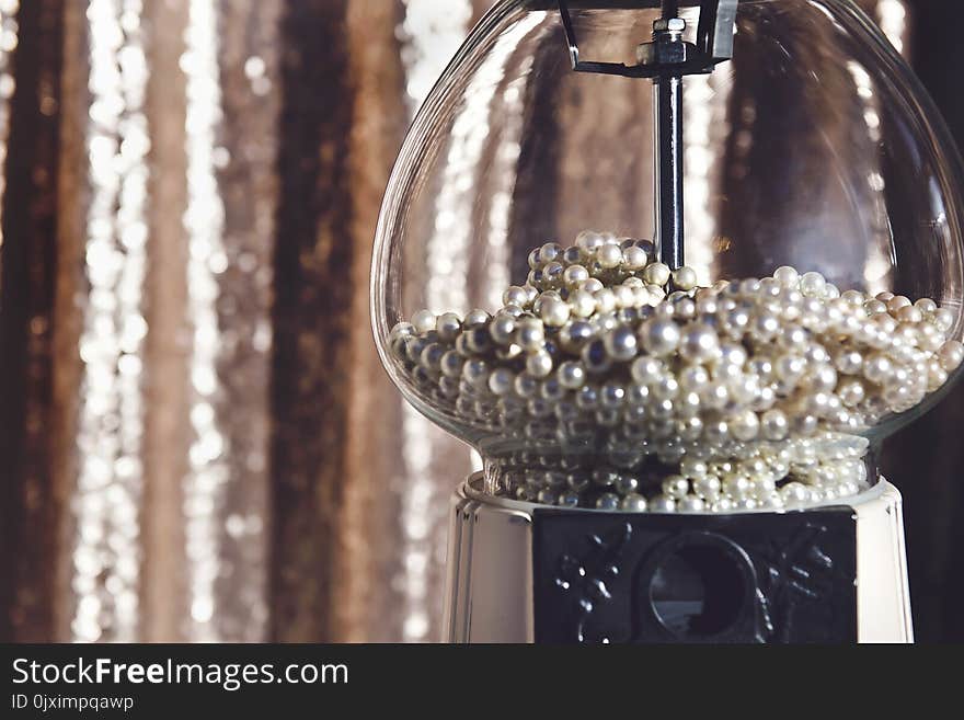 Close-up Photography of Clear Glass Candy Dispenser