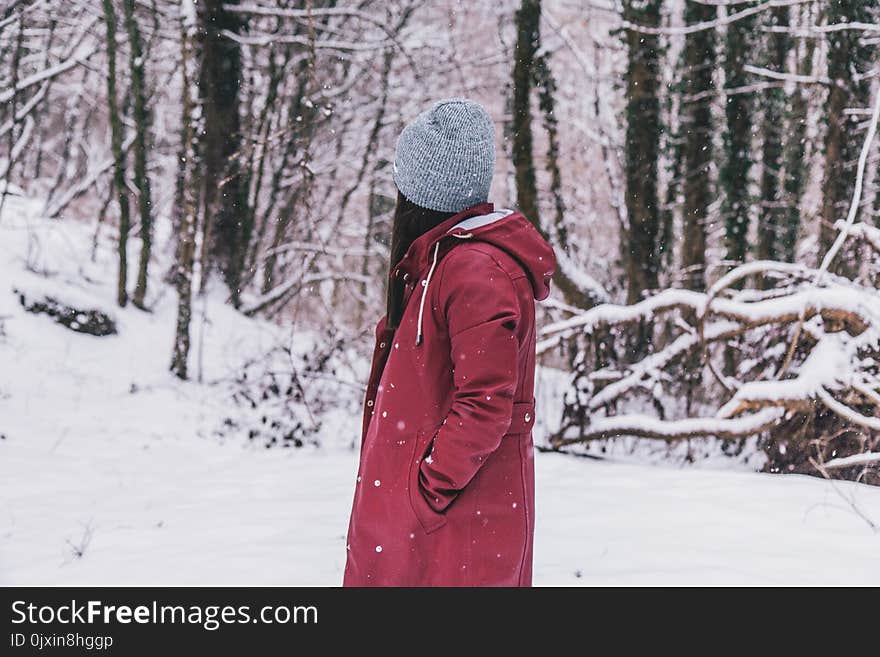 Woman Wearing Red Jacket and Gray Cap