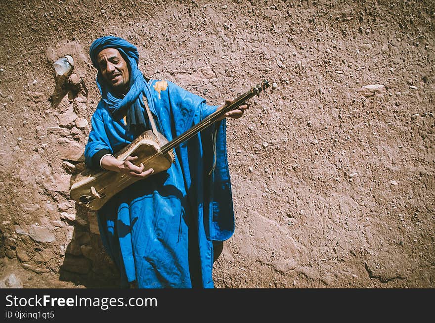 Man Playing Guitar