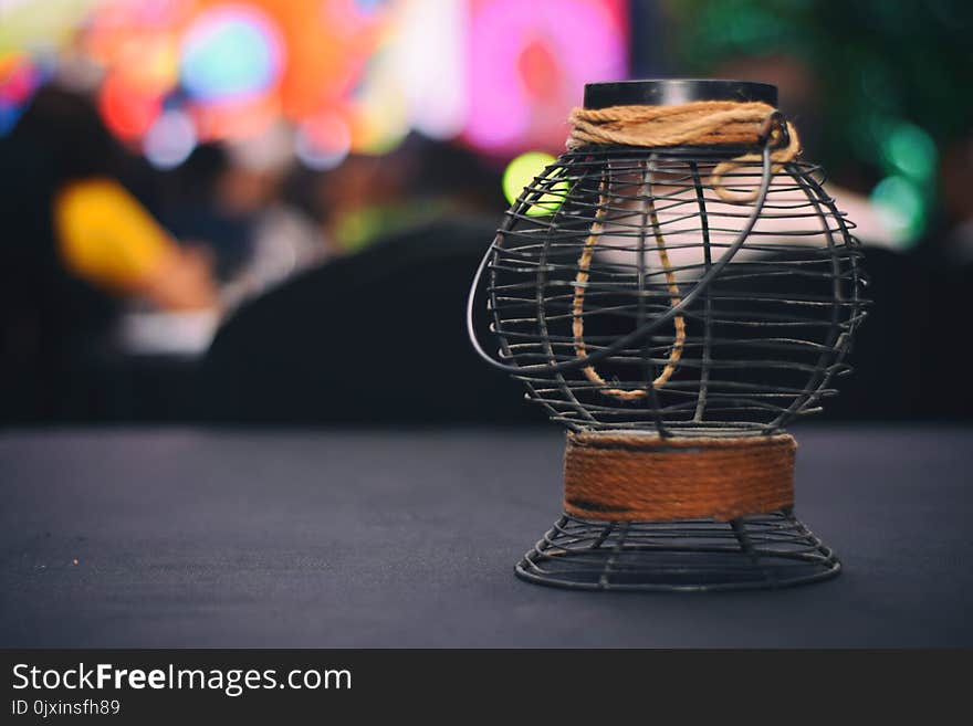 Selective Focus Photograph Od Black and Brown Metal Candle Lantern