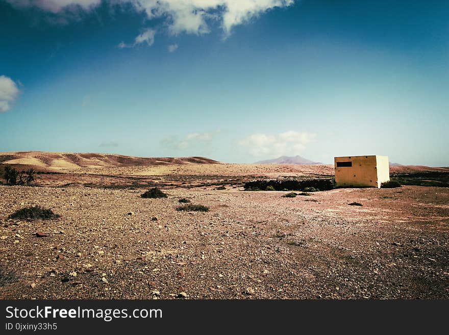 White Concrete Building on Desert