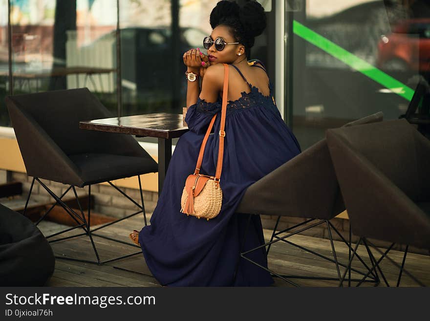 Woman Wearing Blue Spaghetti Strap Dress