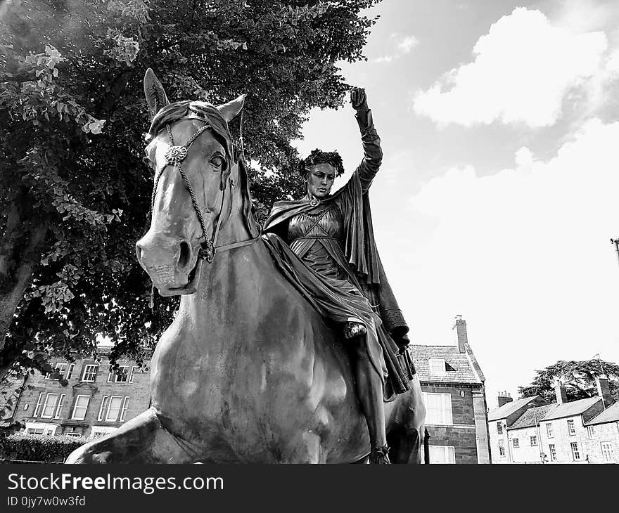 Woman Riding Horse Statue