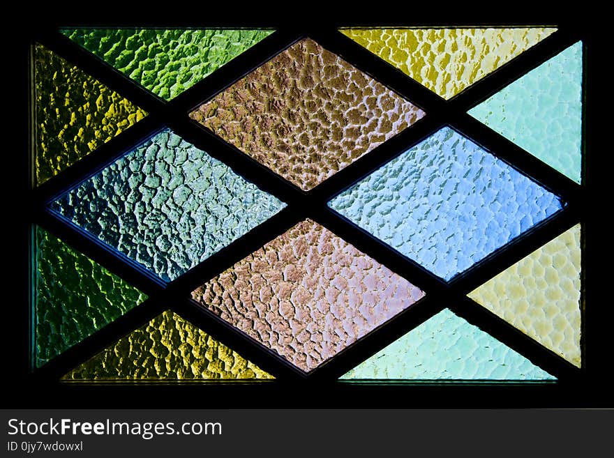 Green, Yellow, Brown, and Blue Stained Glass