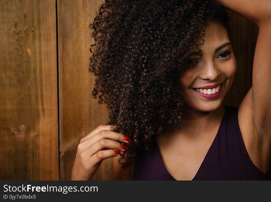 Woman Wearing Black Sleeveless Dress