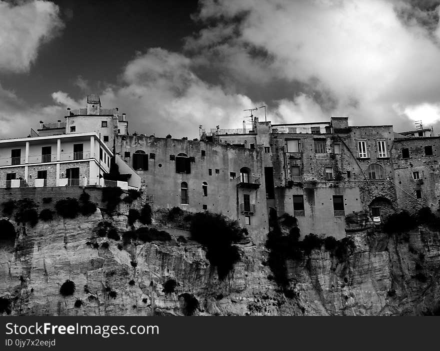 Gray Concrete Building in Grayscale Photo