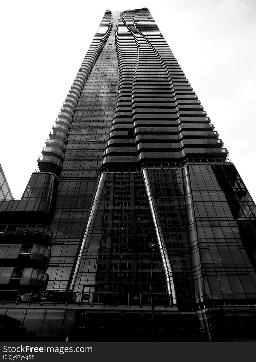 Skyscraper in Toronto under construction with a few unfinished windows and unfinished floor