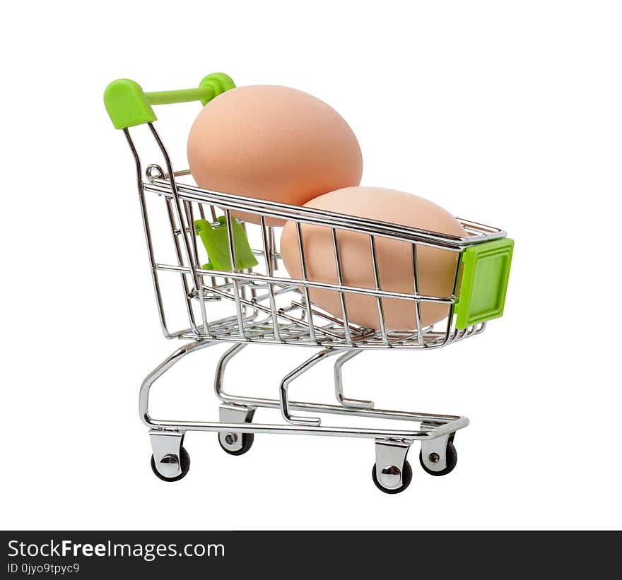 Brown chicken eggs in a shopping basket, isolated on a white background