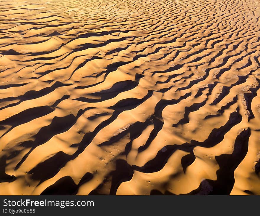 Aerial Top View On Sand Dunes In Desert